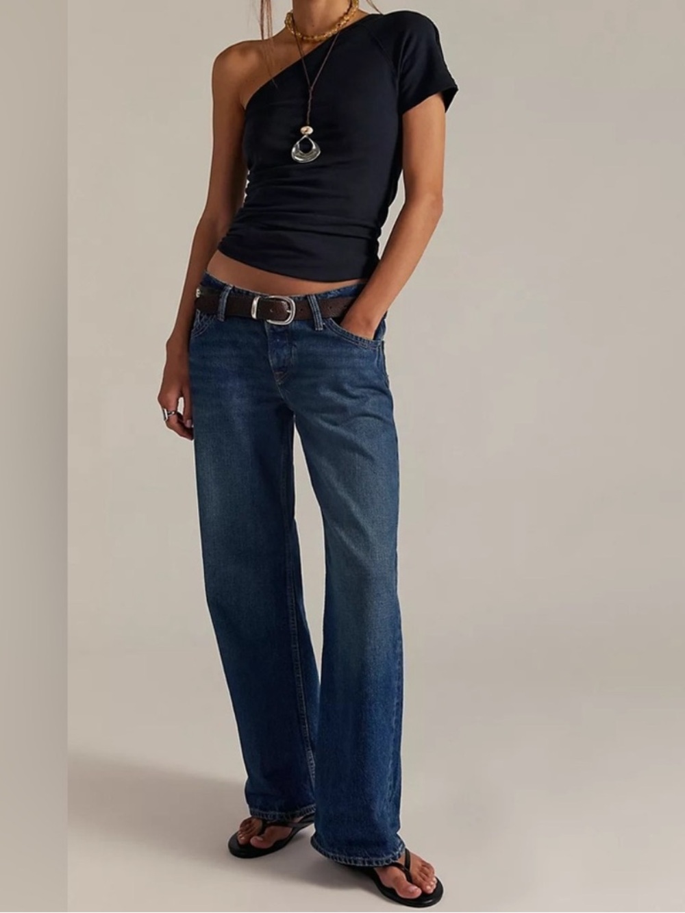 FREE PEOPLE We The Free Tennessee Low-Rise
Boyfriend Jeans Color: Outlaw